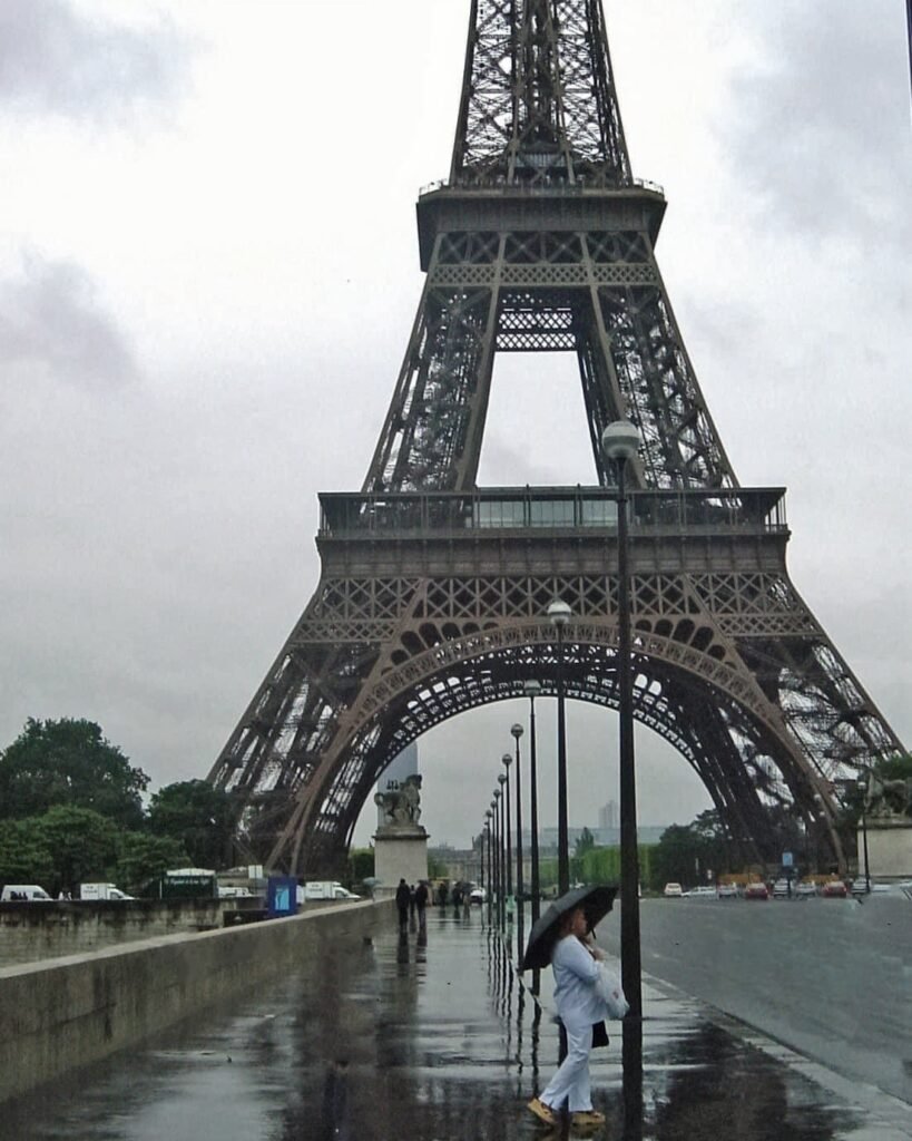 Kathy Fields at the Eiffel Tower in a Designer Fashion Outfit